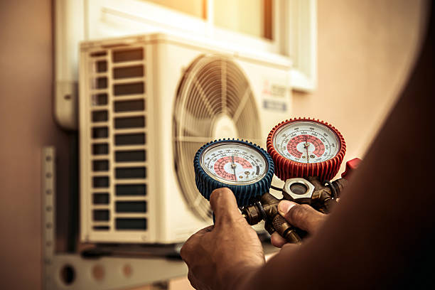 Professional Heat Pump Repair technician working in Crump, TN